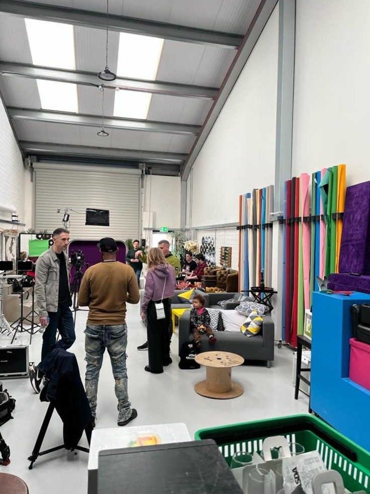 A creative space being filmed and set up